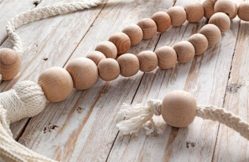 Natural wooden beaded curtain tieback